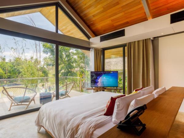 Island Escape Burasari : photo 4 de la chambre villa 1 chambre avec balcon - vue sur lagon - transfert régulier en bateau