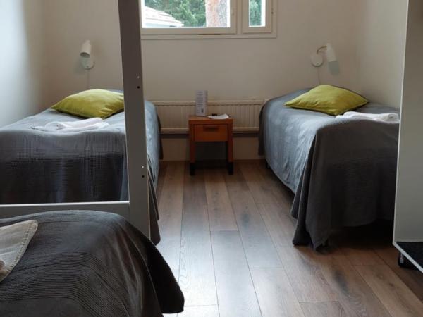 Hostel Tikka : photo 1 de la chambre chambre quadruple avec salle de bains commune