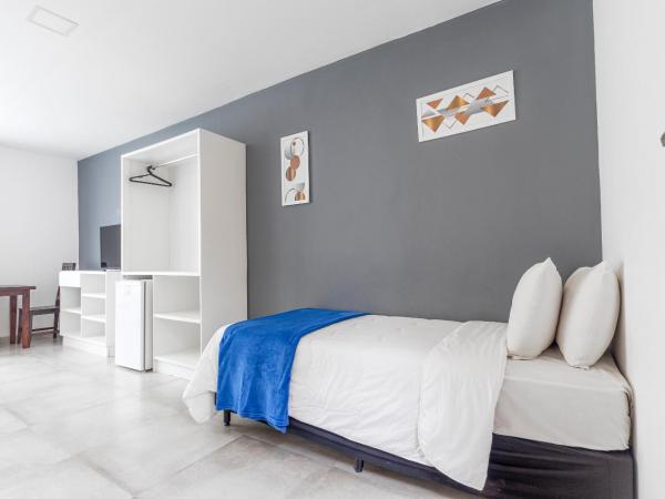 Hotel Ilha Branca Inn : photo 3 de la chambre chambre triple supérieure