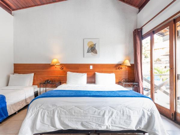 Hotel Ilha Branca Inn : photo 9 de la chambre chambre triple supérieure