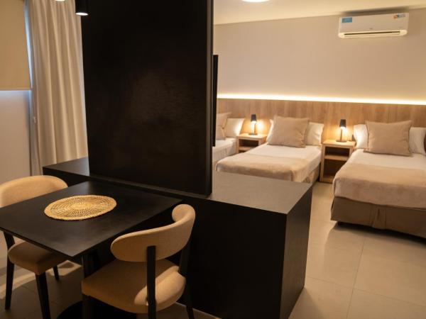 Urbana Suites : photo 2 de la chambre chambre triple exécutive