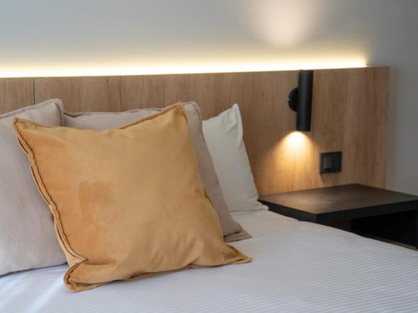 Urbana Suites : photo 3 de la chambre chambre triple exécutive