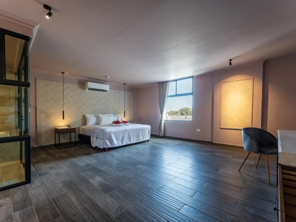 Hotel MID Project : photo 10 de la chambre suite deluxe avec baignoire spa