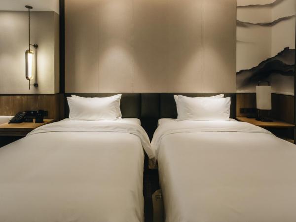 Orienwit Hotel-Free Shuttle Bus fir Canton Fair : photo 1 de la chambre chambre lits jumeaux supérieure