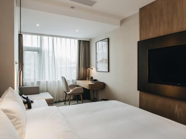 Orienwit Hotel-Free Shuttle Bus fir Canton Fair : photo 8 de la chambre chambre supérieure lit queen-size