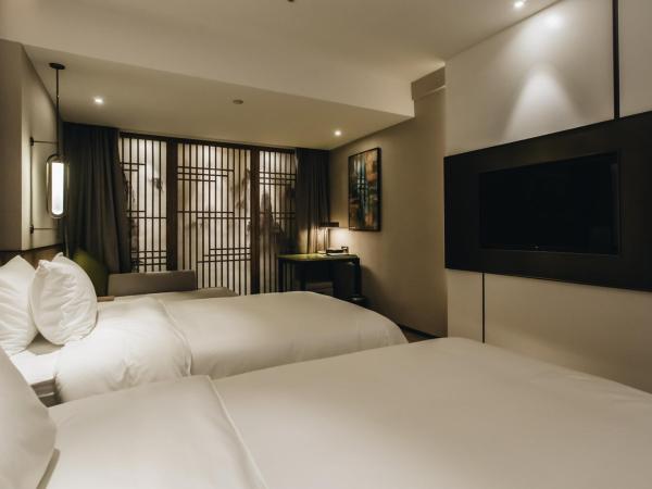 Orienwit Hotel-Free Shuttle Bus fir Canton Fair : photo 4 de la chambre chambre lits jumeaux supérieure