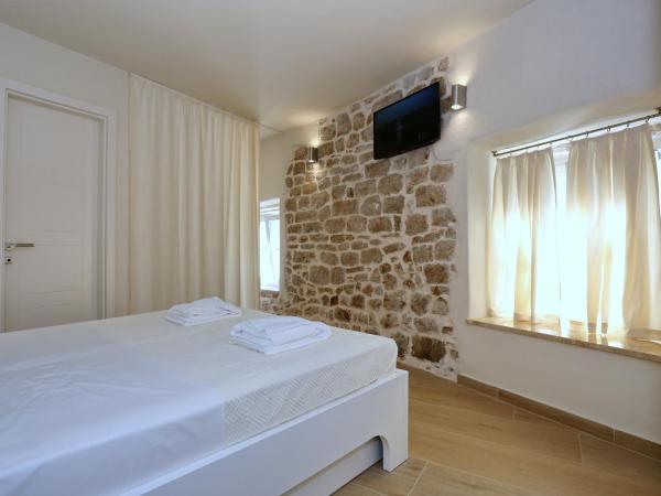 Idassa Palace rooms : photo 2 de la chambre chambre double ou lits jumeaux - bâtiment annexe