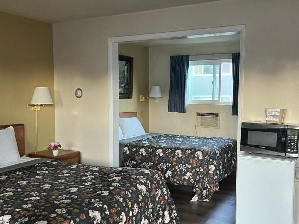 Marco Polo Motel : photo 3 de la chambre chambre classique avec 2 lits queen-size