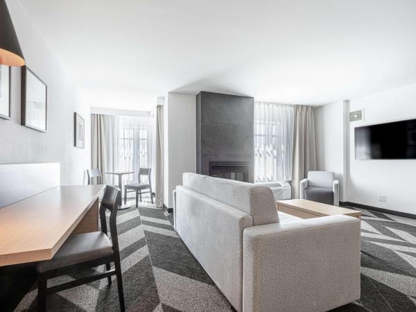 DoubleTree by Hilton Quebec Resort : photo 3 de la chambre suite lit king-size 1 chambre avec cheminée