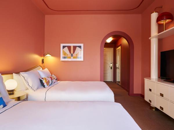 Hotel Genevieve : photo 2 de la chambre chambre deluxe avec 2 lits queen-size