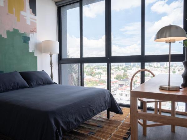 Galeria Flat Rooftop Pool Witgdl : photo 2 de la chambre maison de vacances