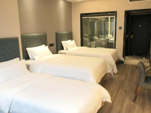 Shenzhen Lido Hotel : photo 2 de la chambre chambre triple
