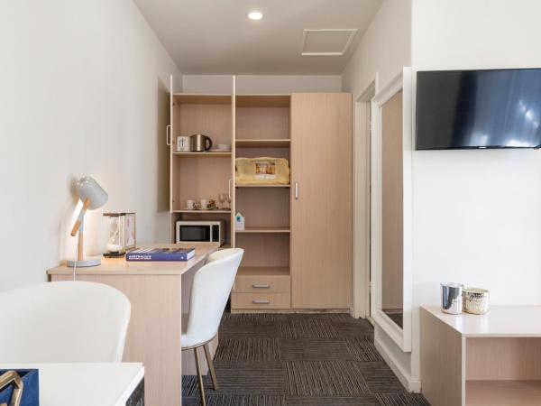 Adelaide Granada Motor Inn : photo 7 de la chambre chambre deluxe