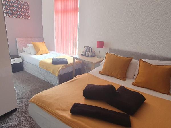 Las Palmas Hotel by the Sea : photo 8 de la chambre chambre triple avec salle de bains privative