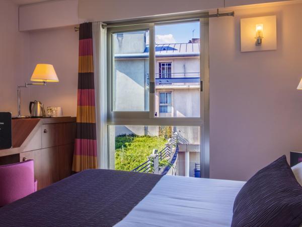 Ampère : photo 1 de la chambre chambre double premium avec vue sur le jardin