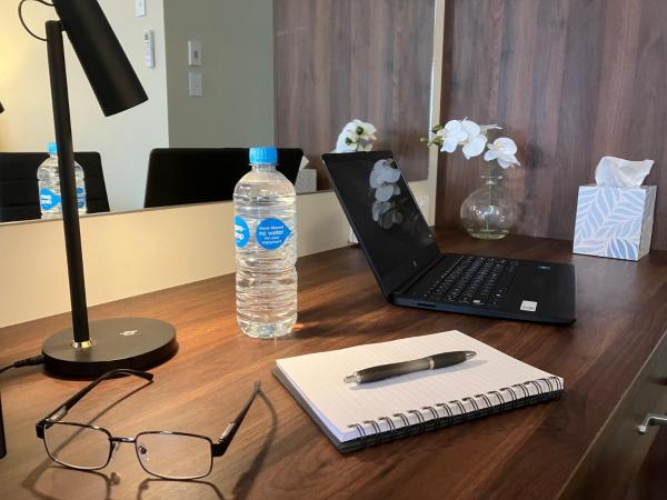 Newina Rotorua : photo 1 de la chambre chambre double affaires avec accès à la salle de sport