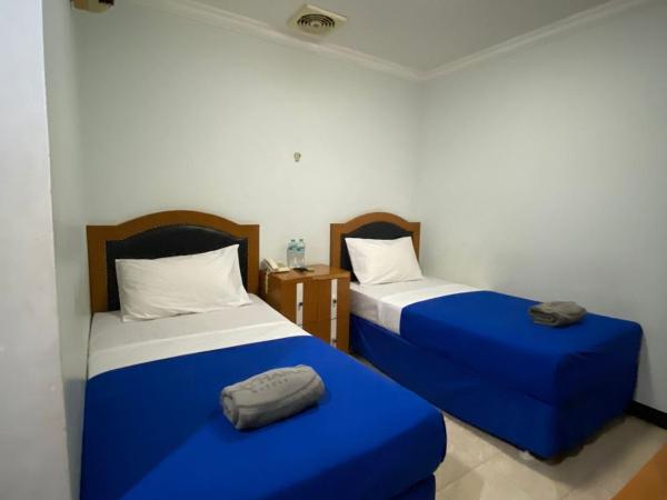 Karsa Utama Hotel : photo 1 de la chambre chambre lits jumeaux standard