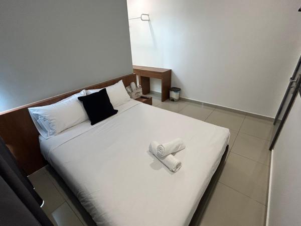 Pets and Family Guesthouse Kota Laksamana, Melaka : photo 7 de la chambre chambre lit queen-size