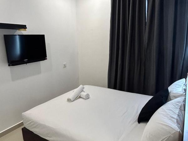 Pets and Family Guesthouse Kota Laksamana, Melaka : photo 3 de la chambre chambre lit queen-size