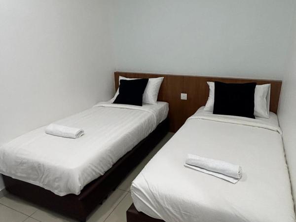 Pets and Family Guesthouse Kota Laksamana, Melaka : photo 5 de la chambre chambre lits jumeaux avec salle de bains