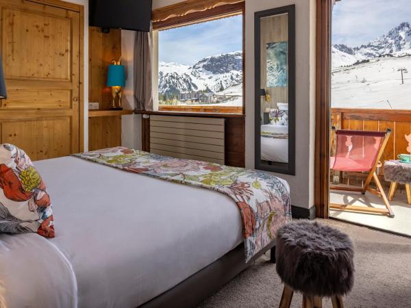 Hôtel Courcheneige : photo 1 de la chambre chambre familiale supérieure