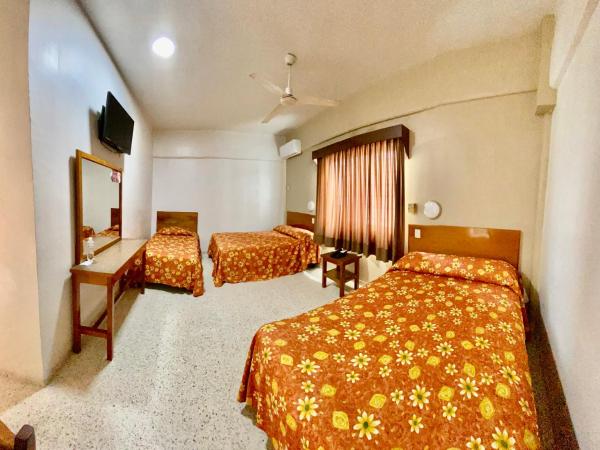 Hotel Delfines : photo 4 de la chambre chambre triple standard