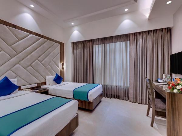 Hotel Suba Star Ahmedabad : photo 3 de la chambre deluxe room - 10% off on laundry, 10% off on f&b, complimentary drivers accommodation