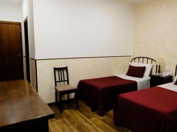 Hotel Villa Nettuno : photo 1 de la chambre chambre lits jumeaux avec terrasse