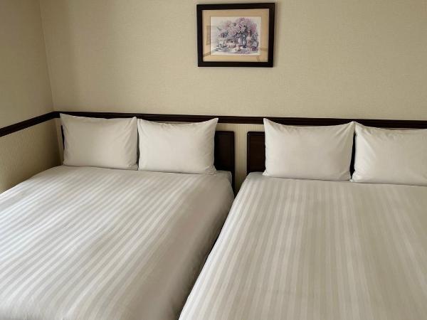 Toyoko Inn Tokyo Shinagawa Konan-guchi Tennozu Isle : photo 3 de la chambre chambre lits jumeaux de luxe - fumeurs