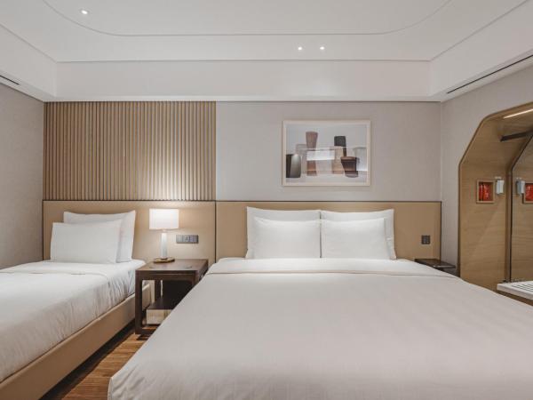 Lotte Hotel World : photo 6 de la chambre suite junior familiale avec lits jumeaux