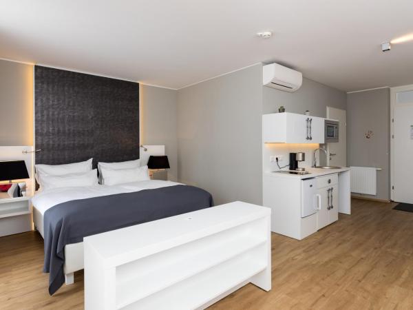 Amedia Luxury Suites Graz, Trademark Collection by Wyndham : photo 5 de la chambre chambre salon - accessible aux personnes à mobilité réduite