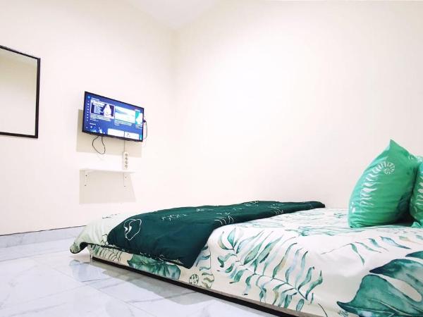 Surabaya Homey near UNAIR Syariah : photo 3 de la chambre chambre lit queen-size 