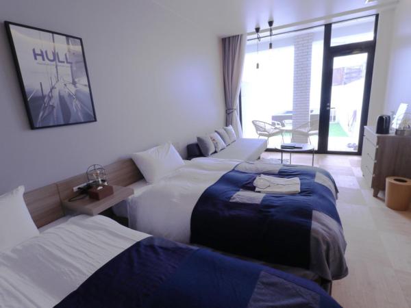 Osaka Hokko Marina HULL : photo 3 de la chambre chambre lits jumeaux standard avec vue sur jardin