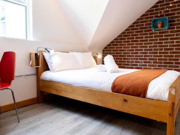 The Nest Boutique Hostel : photo 3 de la chambre chambre familiale avec salle de bains privative