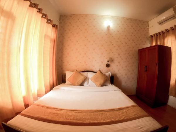 Happy Days Inn : photo 2 de la chambre chambre lit king-size deluxe