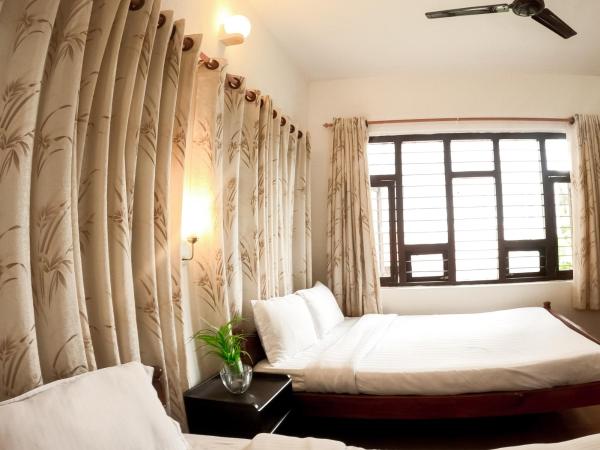 Happy Days Inn : photo 1 de la chambre chambre double ou lits jumeaux