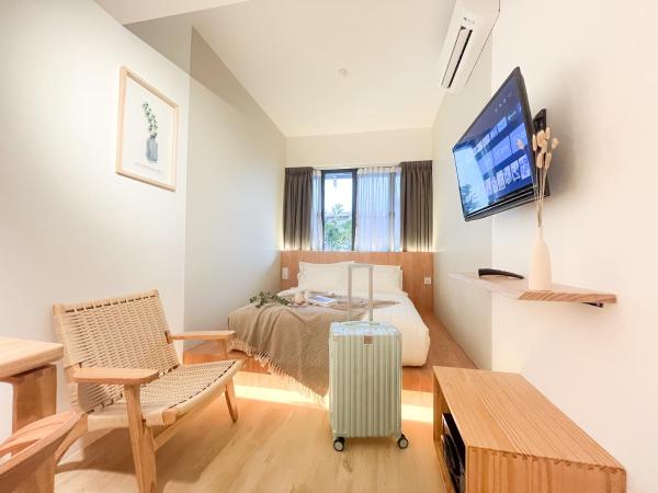 Sleep Box Penang : photo 2 de la chambre deluxe room with shared bathroom