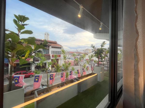 Sleep Box Penang : photo 10 de la chambre deluxe room with shared bathroom