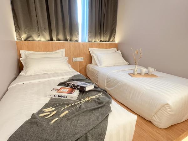 Sleep Box Penang : photo 3 de la chambre chambre lits jumeaux de luxe avec salle de bains commune