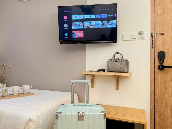 Sleep Box Penang : photo 4 de la chambre chambre lits jumeaux de luxe avec salle de bains commune