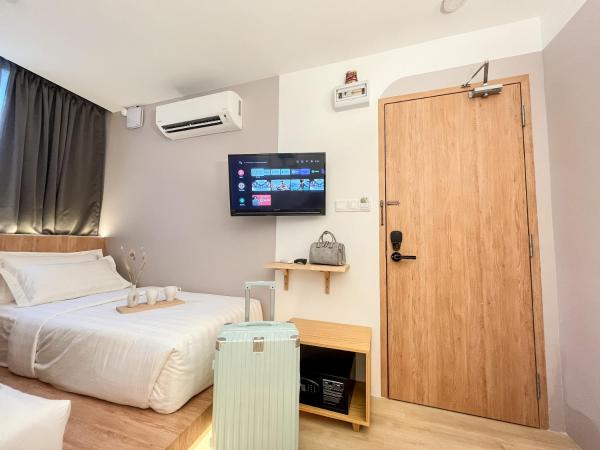 Sleep Box Penang : photo 5 de la chambre chambre lits jumeaux de luxe avec salle de bains commune