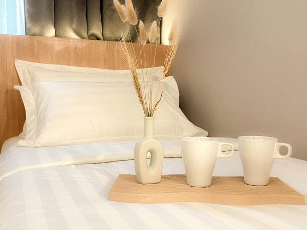 Sleep Box Penang : photo 6 de la chambre chambre lits jumeaux de luxe avec salle de bains commune