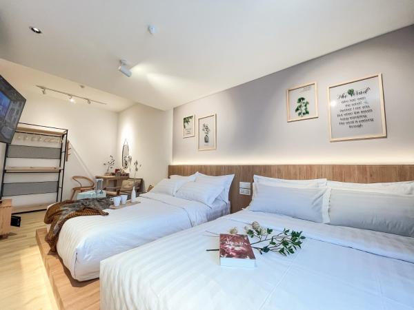 Sleep Box Penang : photo 1 de la chambre chambre quadruple avec salle de bains commune