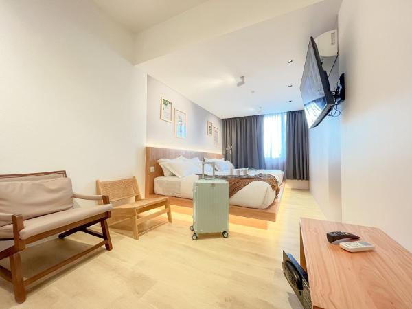 Sleep Box Penang : photo 6 de la chambre chambre quadruple avec salle de bains commune