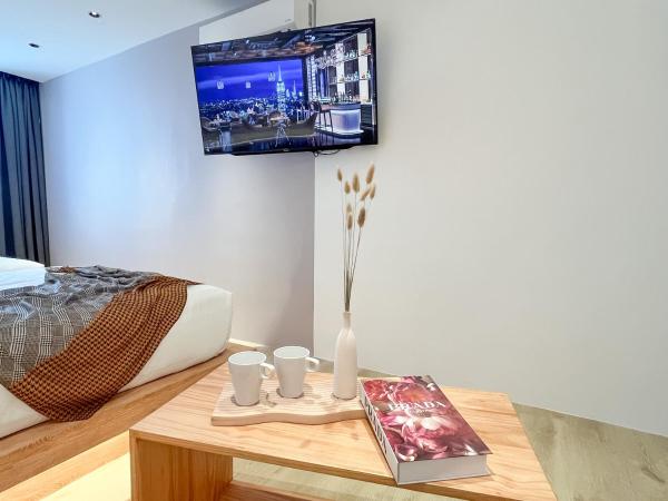 Sleep Box Penang : photo 9 de la chambre chambre quadruple avec salle de bains commune