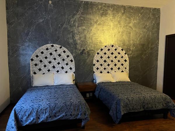 Catedral 304 : photo 6 de la chambre chambre deluxe avec 2 lits queen-size