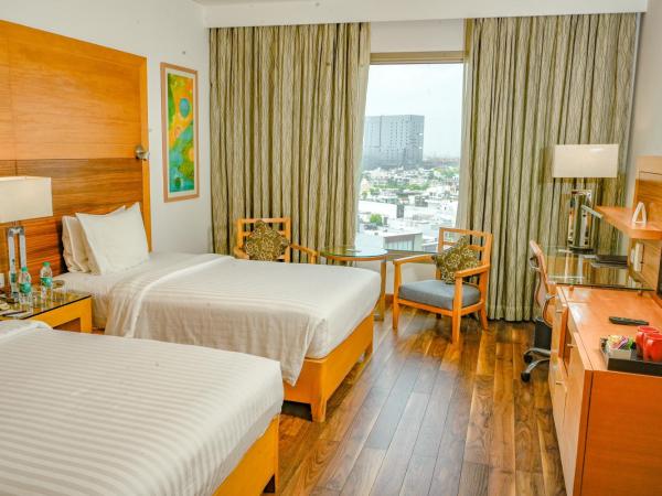 Courtyard by Marriott Gurugram Downtown : photo 1 de la chambre chambre lits jumeaux deluxe