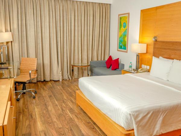 Courtyard by Marriott Gurugram Downtown : photo 3 de la chambre premier king room – 2 pieces pressing, 15% discount on food and beverages, early check-in, wi-fi