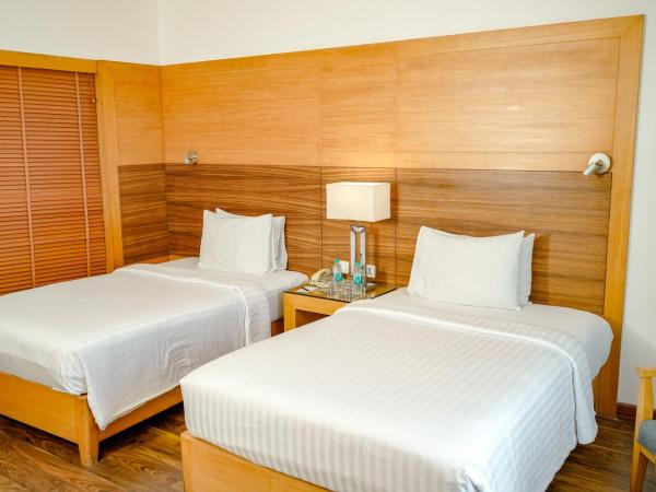 Courtyard by Marriott Gurugram Downtown : photo 5 de la chambre premier twin room – 2 pieces pressing, 15% discount on food and beverages, early check-in, wi-fi