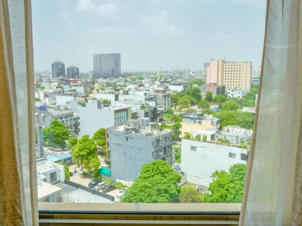 Courtyard by Marriott Gurugram Downtown : photo 5 de la chambre chambre lits jumeaux deluxe